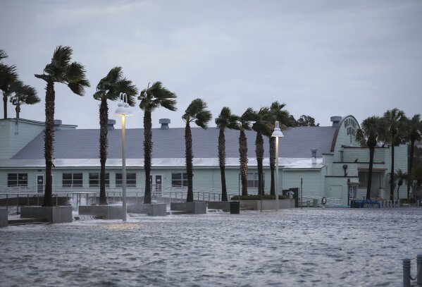 The Gulfport Casino along Shore Boulevard is flooded Wednesday, Aug. 30, 2023 in Gulfport, Fla. Hurricane Idalia made landfall Wednesday in Florida as a Category 3 storm and unleashed devastation along a wide stretch of the Gulf Coast, submerging homes and vehicles, turning streets into rivers, unmooring small boats and downing power lines before sweeping into Georgia. (Chris Urso/Tampa Bay Times via AP)