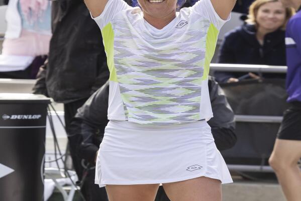 Ons Jabeur, of Tunisia, celebrates after defeating Belinda Bencic, of Switzerland, during the championship match at the Charleston Open tennis tournament in Charleston, S.C., Sunday, April 9, 2023. (AP Photo/Mic Smith)