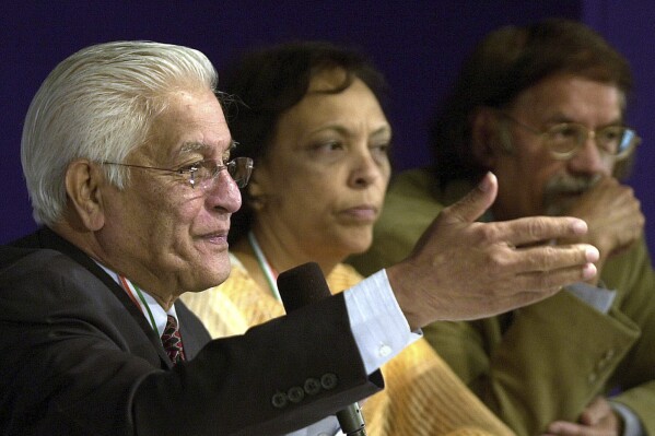 FILE - Basdeo Panday, leader of Trinidad and Tobago's opposition, addresses a session on Tracing the Roots on the third day of Pravasi Bharatiya Divas, or Overseas Indian Day, an annual three-day meeting for Indians living in other countries, in Bombay, India, Jan. 8, 2005. Panday, a former prime minister of Trinidad and Tobago who was the first person of Indian descent to hold that position, died on Jan. 2, 2024 at age 90, according to a statement that his daughter posted on social media. (AP Photo/Aijaz Rahi, File)