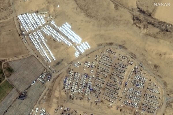 This image provided by Maxar Technologies, shows a rows of tents built near Rafah in Gaza on April 23, 2024. (Satellite image ©2024 Maxar Technologies via AP)