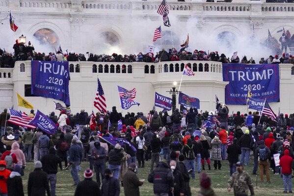 FILE - Violent rioters supporting President Donald Trump storm the Capitol in Washington, Wednesday, Jan. 6, 2021. A former Republican legislative candidate who traveled to Washington for former President Donald Trump's 鈥淪top the Steal鈥� rally was arrested Friday, July 21, 2023, and charged with federal crimes for his role in the U.S. Capitol riot, officials said. (APPhoto/John Minchillo, File)