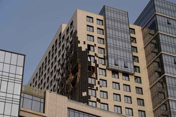 A multi-storey building is seen damaged by a Russian drone strike on Kyiv, Ukraine, Tuesday, June 10, 2025. (AP Photo/Evgeniy Maloletka, file)
