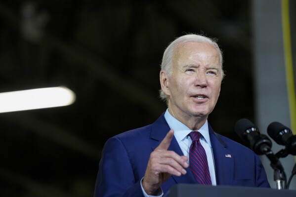 President Joe Biden speaks at Auburn Manufacturing Inc., in Auburn, Maine, Friday, July 28, 2023, before he signs an executive order to encourage companies to manufacture new inventions in the United States. (AP Photo/Susan Walsh)