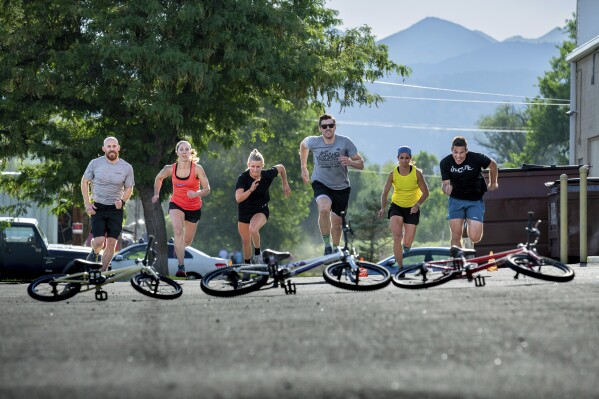Racers competing outside for the title of "King and Queen" of The Alpine Training Center Gym in Boulder, Colo., on July 26, 2023. (Scott Griesser via AP)