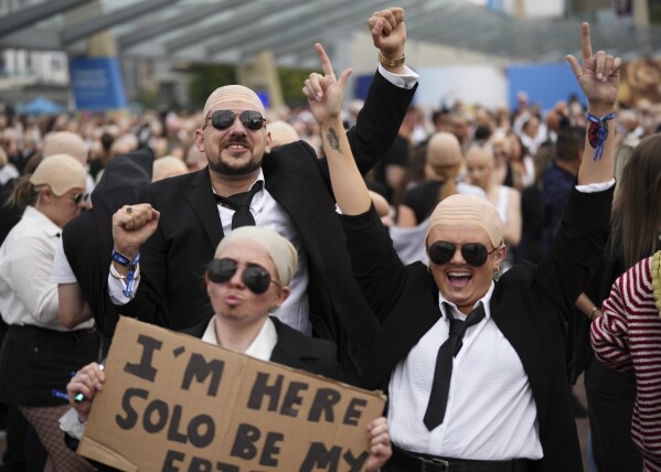 Fans gather in front of the O2 Arena prior to a performance by Pitbull on Monday, June 9, 2025, in London. (Photo by Scott A Garfitt/Invision/AP)