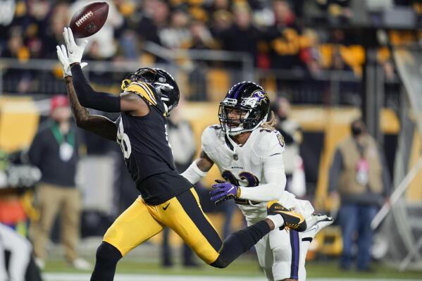 Pittsburgh Steelers wide receiver Diontae Johnson (18) cannot make the catch on a pass as Baltimore Ravens cornerback Anthony Averett (23) defends during the first half of an NFL football game, Sunday, Dec. 5, 2021, in Pittsburgh. (AP Photo/Gene J. Puskar)