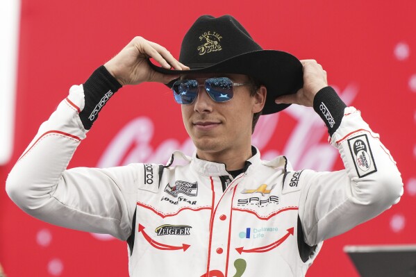 Carson Hocevar is introduced to fans prior to a NASCAR Cup Series auto race at Charlotte Motor Speedway, Sunday, May 25, 2025, in Concord, N.C. (AP Photo/Matt Kelley)