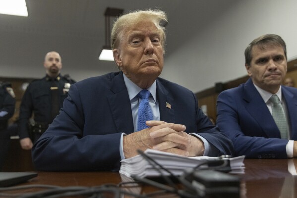 Former President Donald Trump appears at Manhattan criminal court before his trial in New York, Friday, April 26, 2024. (Jeenah Moon/Pool Photo via AP)