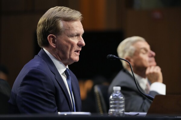 PGA Tour chief operating officer Ron Price, left, testifies alongside PGA Tour board member Jimmy Dunne during a Senate Subcommittee on Investigations hearing on the proposed PGA Tour-LIV Golf partnership, Tuesday, July 11, 2023, on Capitol Hill in Washington. (AP Photo/Patrick Semansky)