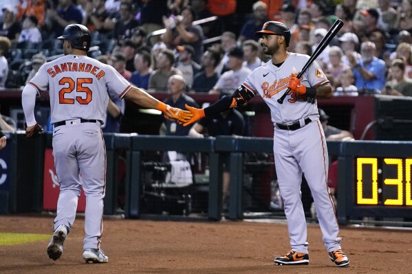 Baltimore Orioles' Cedric Mullins pauses at first base after hitting a  single against the Arizona Diamondbacks during the ninth inning of a  baseball game Friday, Sept. 1, 2023, in Phoenix. The Diamondbacks