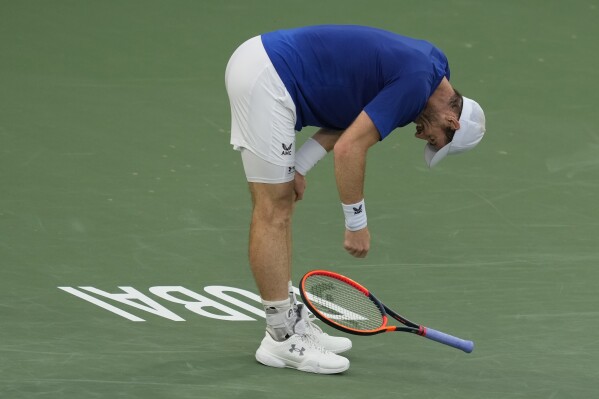 Andrew Murray from Great Britain reacts after losing a ball to Ugo Humbert of France during a match of the Dubai Duty Free Tennis Championships in Dubai, United Arab Emirates, Wednesday, Feb. 28, 2024. (AP Photo/Kamran Jebreili)