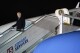 FILE - President Joe Biden arrives at a military airport in Warsaw, Poland, Monday, Feb. 20, 2023. Social media users shared a video of people deplaning Air Force One and a person falling down the stairs, falsely claiming it was Biden. (AP Photo/Evan Vucci)