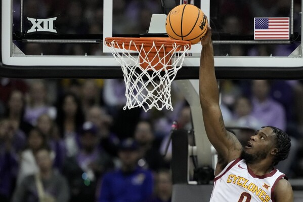 Iowa State forward Tre King (0) puts up a shot during the first half of an NCAA college basketball game against Kansas State in the quarterfinal round of the Big 12 Conference tournament, Thursday, March 14, 2024, in Kansas City, Mo. (AP Photo/Charlie Riedel)