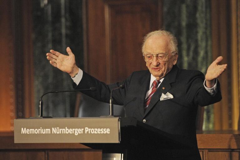 FILE - Benjamin Ferencz, Romanian-born American lawyer and chief prosecutor of the Nuremberg war crimes trials, speaks during an opening ceremony for the exhibition commemorating the Nuremberg war crimes trials in Nuremberg, Germany, Sunday, Nov. 21, 2010. Ferencz, the last living prosecutor from the Nuremberg trials, who tried Nazis for genocidal war crimes and was one of the first outside witnesses to document the atrocities of Nazi labor and concentration camps as a U.S. Army soldier, died Friday evening, April 7, 2023, in Boynton Beach, Fla.,, according to St. John's University law professor John Barrett, who runs a blog about the Nuremberg trials. He had just turned 103 in March. (Armin Weigel/Pool Photo via AP, File)