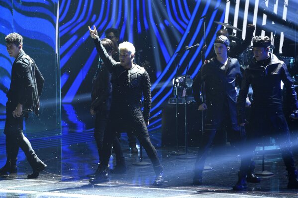 
              CNCO performs "Regaetton Lento" at the 18th annual Latin Grammy Awards at the MGM Grand Garden Arena on Thursday, Nov. 16, 2017, in Las Vegas. (Photo by Chris Pizzello/Invision/AP)
            