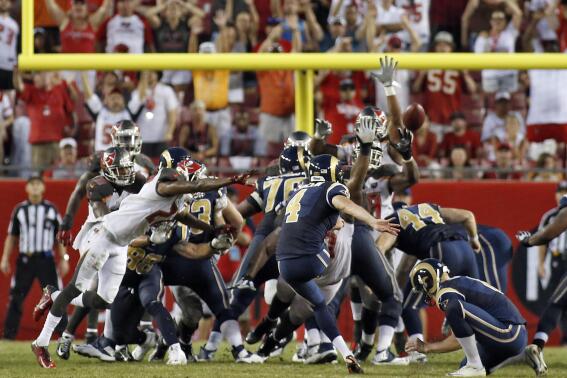 St. Louis Rams kicker Greg Zuerlein (4) kicks a field goal against the Tampa Bay Buccaneers during the fourth quarter of an NFL football game Sunday, Sept. 14, 2014, in Tampa, Fla. The Rams defeated the Buccaneers 19-17. (AP Photo/Brian Blanco)