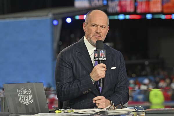 FILE -NFL Network anchor Rich Eisen talks during the broadcast of the 2023 NFL Draft at the Union Station on Thursday, April 27, 2023 in Kansas City, Mo. Rich Eisen has had many memorable moments during his long tenure at NFL Network. This weekend though might end up joining them. Saturday, Nov. 4, 2023 marks 20 years since NFL Network went on the air with Eisen anchoring “Total Access.”(AP Photo/Peter Aiken, File)