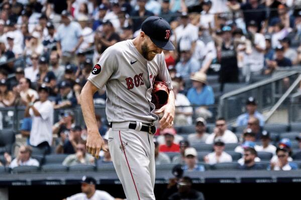 Boston Red Sox starting pitcher Chris Sale walks off the mound after a hand injury during the second inning of a baseball game against the New York Yankees, Sunday, July 17, 2022, in New York. (AP Photo/Julia Nikhinson)