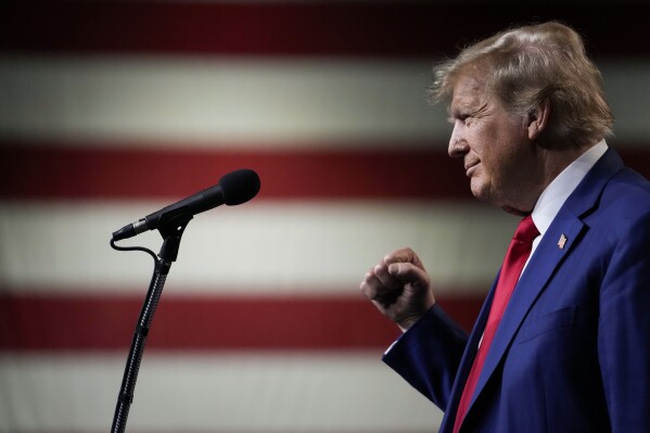 Former President Donald Trump is introduced to the crowd during a rally Sunday, Dec. 17, 2023, in Reno, Nev. (AP Photo/Godofredo A. Vásquez)