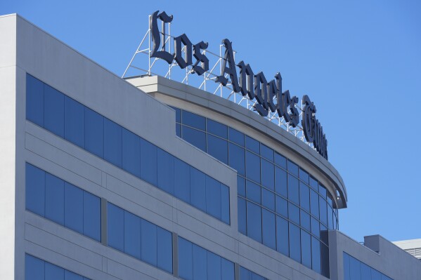 The Los Angeles Times newspaper headquarters is located in El Segundo, Calif., Tuesday, Jan. 23, 2024. The Los Angeles Times plans to lay off 94 newsroom employees starting Tuesday, according to the head of the journalists' union who said the number, while substantial, is less than feared. (AP Photo/Damian Dovarganes)