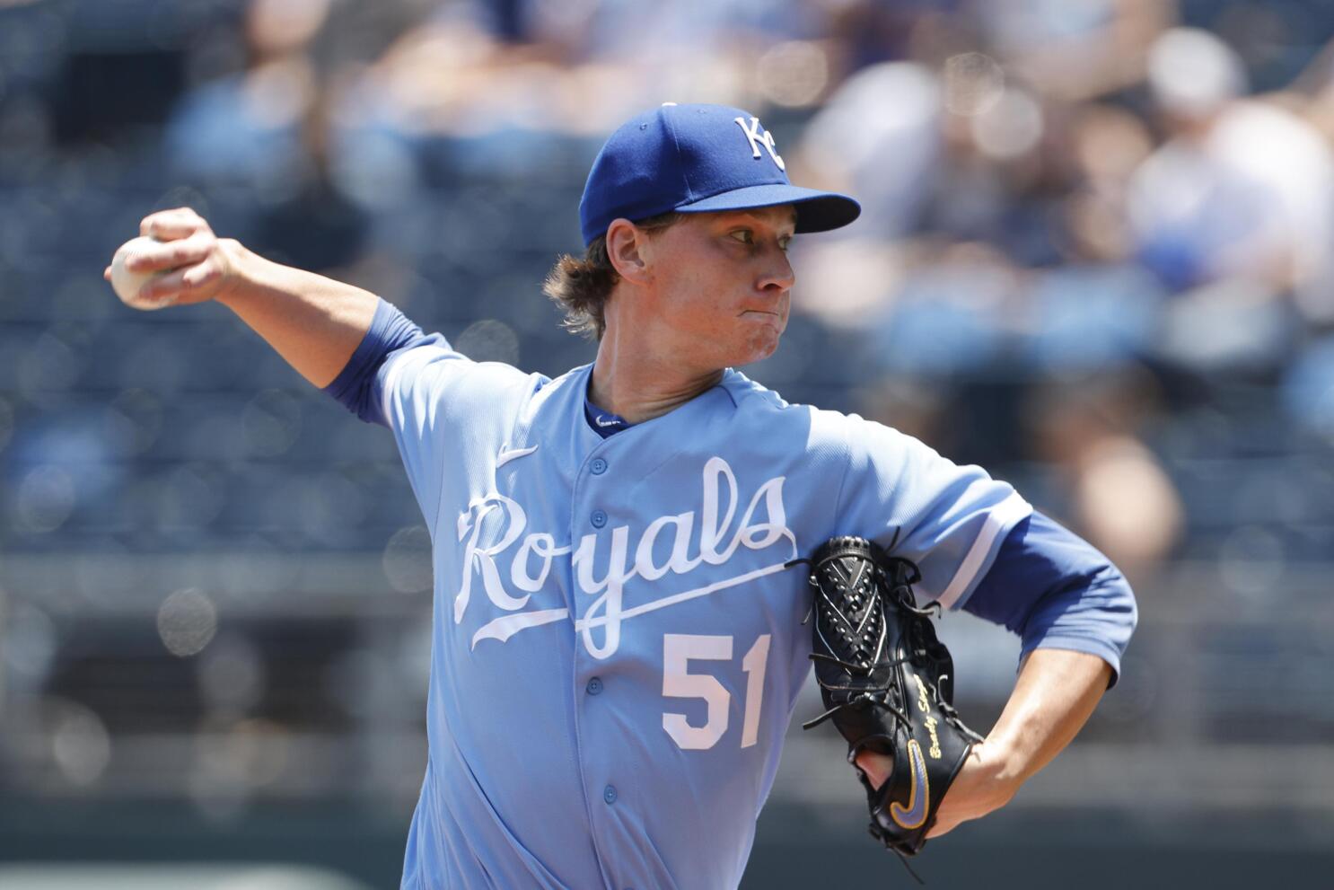 Singer pitches into sixth, Royals beat Rockies 2-0 to avoid sweep