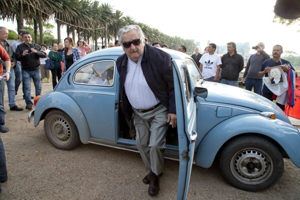 TO HOLD - Uruguay's former President Jose Mujica arrives to cast his vote in Montevideo, Uruguay, Oct. 26, 2014. (AP Photo/Natacha Pisarenko, File)
