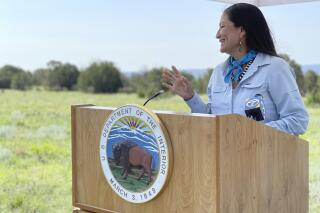 FILE - In this photo released by the Office of the Secretary Department of the Interior, U.S. Interior Secretary Deb Haaland speaks at the Sabinoso Wilderness in Las Vegas, N.M., July 17, 2021. The U.S. Department of the Interior renamed five places in four states that had featured a racist term for a Native American woman until Thursday, Jan. 12, 2023. (Felicia A. Salazar/U.S. Department of the Interior via AP, File)