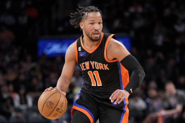 New York Knicks guard Jalen Brunson (11) dribbles up the court during the second half of an NBA basketball game against the Brooklyn Nets, Wednesday, March 1, 2023, in New York. (AP Photo/John Minchillo)