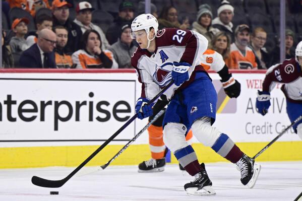 Colorado Avalanche's Nathan MacKinnon skates up ice during the first period of an NHL hockey game against the Philadelphia Flyers, Monday, Dec. 5, 2022, in Philadelphia. (AP Photo/Derik Hamilton)