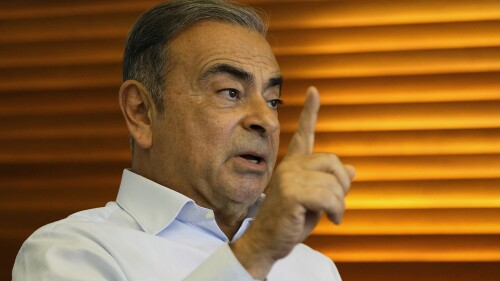 Former Nissan executive Carlos Ghosn speaks during an interview with The Associated Press in Beirut, Lebanon, Friday, June 23, 2023. Ghosn said Friday that the $1 billion lawsuit he recently filed against Nissan and others is "extremely reasonable” as the suffering he went through cannot be compensated. (AP Photo/Hassan Ammar)