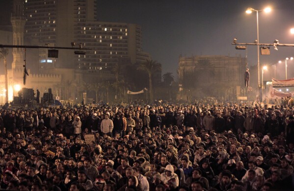 Effigies of Egyptian President Hosni Mubarak hang from traffic lights as Egyptian anti-government protesters gathered in Tahrir (Liberation) Square, to watch U.S. President Barack Obama, not seen, live on a TV broadcast from Washington, speaking about the situation in Egypt, early Wednesday, Feb. 2, 2011. (AP Photo/Lefteris Pitarakis, File)