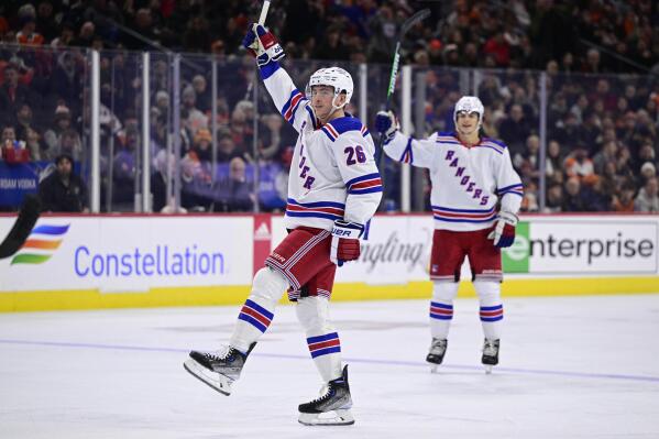 New York Rangers' Jimmy Vesey (26) celebrates after scoring a goal during the third period of an NHL hockey game against the Philadelphia Flyers, Saturday, Dec. 17, 2022, in Philadelphia. (AP Photo/Derik Hamilton)