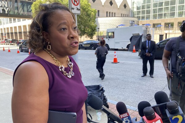 DeKalb County District Attorney Sherry Boston speaks to reporters Friday, Sept. 22, 2023, outside the Fulton County Courthouse in Atlanta. Boston is one of four Georgia district attorneys who sued to overturn a law that lets a new commission to discipline and remove prosecutors. A Fulton County judge heard arguments over whether she should freeze the law. (AP Photo/Jeff Amy)