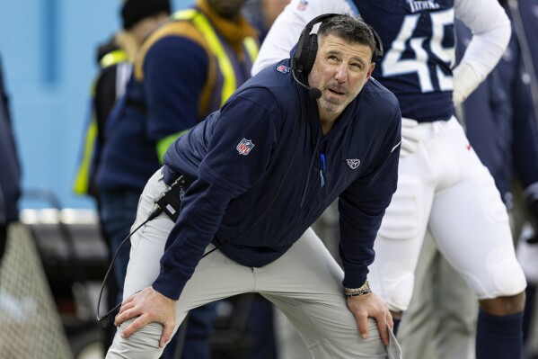 FILE - Tennessee Titans head coach Mike Vrabel watches play on the Jumbotron during their NFL football game against the Jacksonville Jaguars, Sunday, Jan. 7, 2024, in Nashville, Tenn. The former Titans head coach, fired in January after consecutive losing seasons, landed as an as analyst and personnel consultant for the Cleveland Browns on Friday, March 15, 2024. (AP Photo/Wade Payne, File)