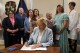 FILE - Maine Gov. Janet Mills signs into law a bill expanding access to abortions later in pregnancy, July 19, 2023, at the State House in Augusta, Maine. Groups opposed to Maine's new law expanding abortion access won't attempt to nullify the statute through a so-called People's Veto referendum. Republican Rep. Laurel Libby, leader of the Speak Up for LIFE group, said Wednesday that allies have decided to focus their resources on electing candidates who are opposed to abortions instead of collecting signatures and running a referendum campaign. (AP Photo/Robert F. Bukaty, File)