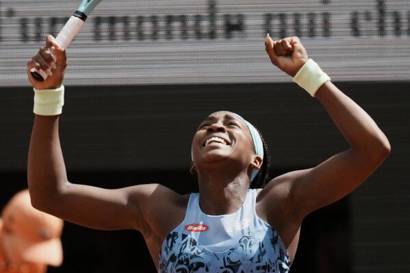 Coco Gauff of the U.S. celebrates as she defeats Sloane Stephens of the U.S. after their quarterfinal match of the French Open tennis tournament at the Roland Garros stadium Tuesday, May 31, 2022 in Paris. Gauff won 7-5, 6-2. (AP Photo/Thibault Camus)