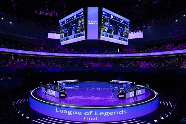 Teams of Taiwan and South Korea compete during the Esport League of Legends final at the 19th Asian Games in Hangzhou, China, Friday, Sept. 29, 2023. The South Korean team won gold medal and also an exemption from military service at home. (AP Photo/Louise Delmotte)