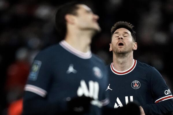 PSG's Lionel Messi, right, reacts after missing a chance to score during the French League One soccer match between Paris Saint-Germain and Nice at the Parc des Princes stadium in Paris, France, Wednesday, Dec. 1, 2021. (AP Photo/Thibault Camus)