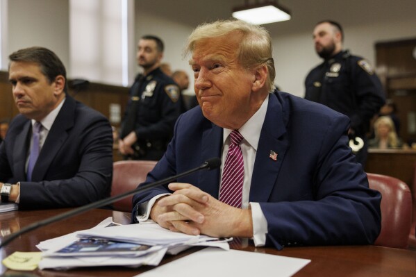 Former President Donald Trump appears at Manhattan criminal court in New York, Friday, April 19, 2024.  (Sarah Yenesel/Pool Photo via AP)