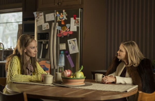 This image released by FX shows Juno Temple, left, and Jennifer Jason Leigh in a scene from "Fargo." (Michelle Faye/FX via AP)