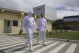 Employees walk on the plant grounds of meatpacker JBS, in Lapa, in the Brazilian state of Parana, March 21, 2017. (AP Photo/Eraldo Peres, File)