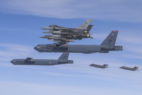 FILE - In this photo provided by the South Korean Defense Ministry, U.S. B-52H bombers, center, and F-16 fighter jets and South Korean Air Force F-35A fighter jets, right bottom, fly over the Korean Peninsula during a joint air drill in South Korea on April 14, 2023. The United States flew nuclear-capable bombers to the Korean Peninsula on Friday, June 30, in its latest show of force against North Korea, days after the North staged massive anti-U.S. rallies in its capital. (South Korea Defense Ministry via AP, File)