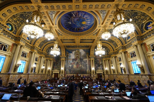 FILE - Members of the Pennsylvania House of Representatives attend a session at the state Capitol in Harrisburg, Pa., June 29, 2023. Pennsylvania's April 23, 2024, primary election will select candidates for the Legislature, statewide “row offices” and 17 Congressional seats. (AP Photo/Matt Rourke, file)