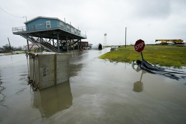 Foodwaters cover the street Friday, Aug. 28, 2020, in Cameron, La., after Hurricane Laura moved through the area Thursday. (AP Photo/David J. Phillip)