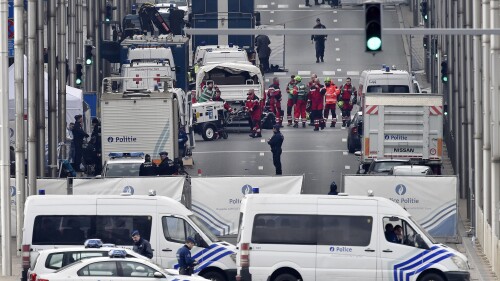 FILE - Police and rescue teams are pictured outside the metro station Maelbeek after an incident, in Brussels, Tuesday, March 22, 2016. A jury is expected to render its verdict Tuesday, July 25, 2023 over Belgium’s deadliest peacetime attack. The suicide bombings at the Brussels airport and a busy subway station in 2016 killed 32 people in a wave of violence in Europe claimed by the Islamic State group. Among the 10 defendants is Salah Abdeslam, serving a life sentence in France over his role in 2015 Paris attacks. (AP Photo/Martin Meissner, File)