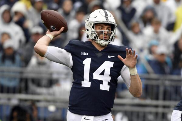 Penn State quarterback Sean Clifford (14) passes against Illinois during an NCAA college football game in State College, Pa., Saturday, Oct. 23, 2021. (AP Photo/Barry Reeger)