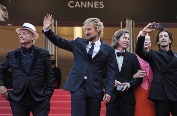 FILE - In this July 12, 2021 file photo Bill Murray, from left, Owen Wilson, director Wes Anderson, Tilda Swinton, and Adrien Brody pose for photographers upon arrival at the premiere of the film 'The French Dispatch' at the 74th international film festival, Cannes, southern France. (AP Photo/Brynn Anderson, File)