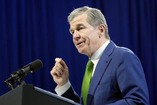 FILE - North Carolina Gov. Roy Cooper speaks before President Joe Biden at the Wilmington Convention Center, Thursday, May 2, 2024, in Wilmington. North Carolina Gov. Roy Cooper vetoed a transportation bill he said would hold back the state's natural beauty. (AP Photo/Alex Brandon, file)