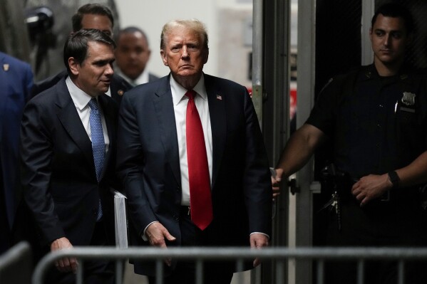 Former President Donald Trump returns from a break at Manhattan Criminal Court, Tuesday, May 28, 2024, in New York. (AP Photo/Julia Nikhinson, Pool)