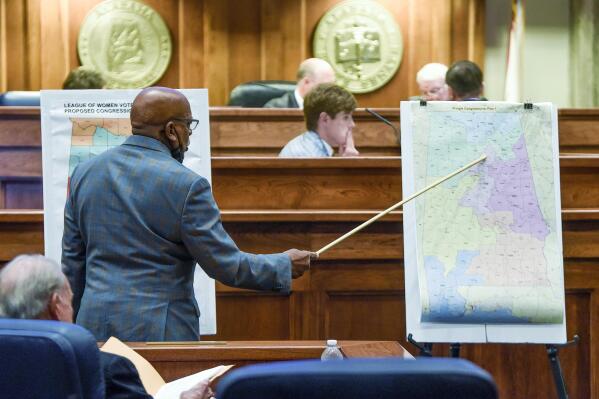 FILE - Sen. Rodger Smitherman compares U.S. Representative district maps during the special session on redistricting at the Alabama Statehouse in Montgomery, Ala., Nov. 3, 2021. (Mickey Welsh/The Montgomery Advertiser via AP, File)